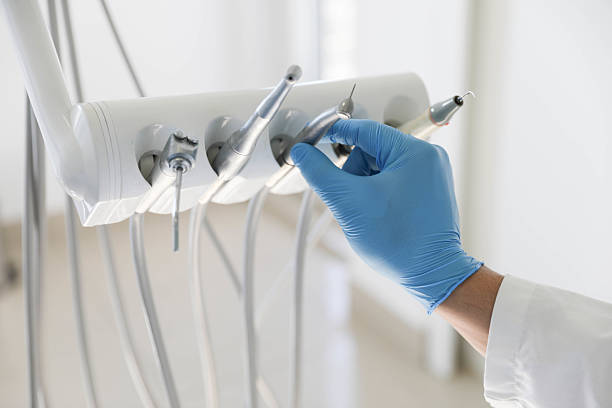 Professional Tooth Extraction technician working in Lancaster, SC